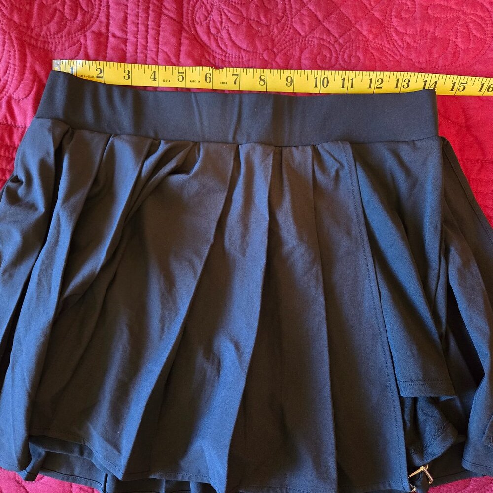 Halara Black skort with buckle on leg